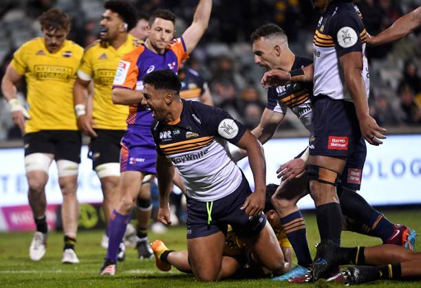 (C) of the Brumbies scores a try during the Super Rugby Pacific quarterfinal match between the Australia's Brumbies and New Zealand's Hurricanes at GIO Stadium in Canberra on June 4, 2022. - -- IMAGE RESTRICTED TO EDITORIAL USE - STRICTLY NO COMMERCIAL USE --