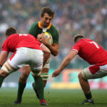 Eben Etzebeth of South Africa attempts to get past Will Rowlands of Wales and Tommy Reffell of Wales during the 2022 Castle Lager Incoming Series match between South Africa and Wales held at Cape Town Stadium in Cape Town, South Africa on 16 July 2022