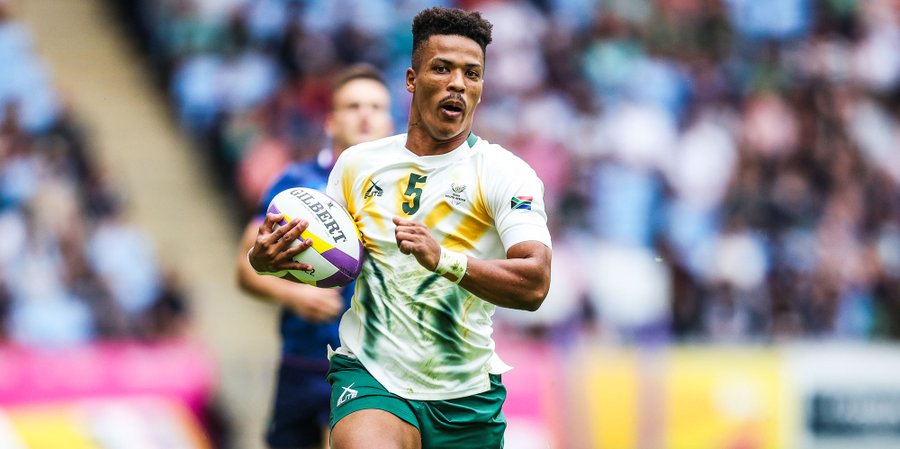 Angelo Davids scores for South Africa at the Commonwealth Games sevens Blitzboks