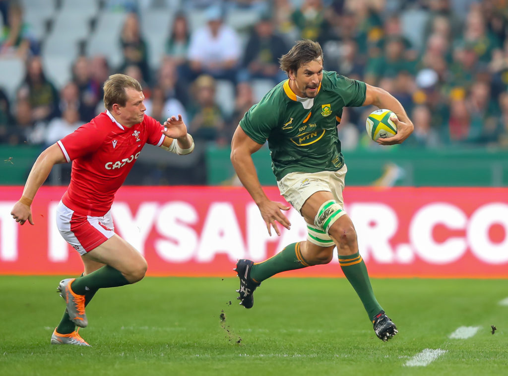 CAPE TOWN, SOUTH AFRICA - JULY 16: Charging Eben Etzebeth of the Springboks in his 100th game during the 3rd Castle Lager Incoming Series test match between South Africa and Wales at DHL Stadium on July 16, 2022 in Cape Town, South Africa.