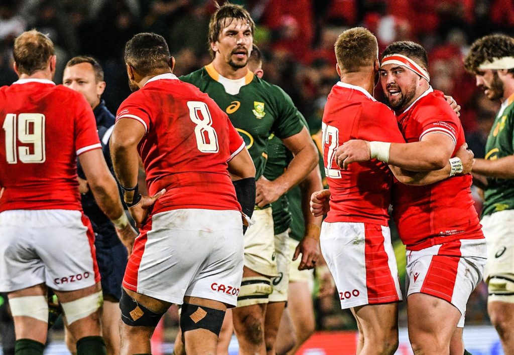 Wales celebrate a first win over the Springboks in SA