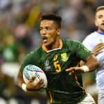 CAPE TOWN, SOUTH AFRICA - SEPTEMBER 09: Angelo Davids of South Africa during day 1 of the MenÕs Rugby World Cup Sevens 2022 Round of 16, Match 16 between South Africa and Chile at DHL Stadium on September 09, 2022 in Cape Town, South Africa