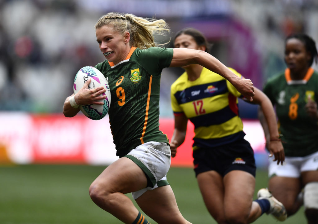 CAPE TOWN, SOUTH AFRICA - SEPTEMBER 10: Nadine Roos of South Africa on her way to scores a try during day 2 of the Rugby Womens World Cup Sevens 2022 Challenge 13/16 Place match18 between South Africa and Colombia at DHL Stadium on September 10, 2022 in Cape Town, South Africa.