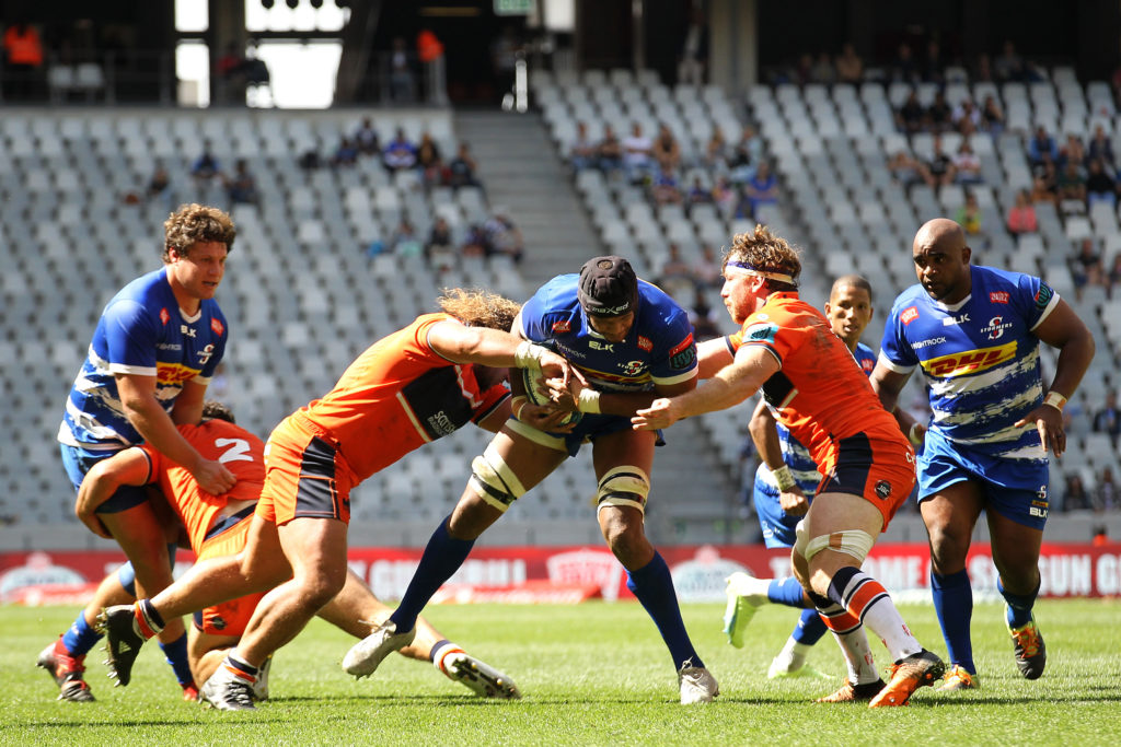 Stormers captain Marvin Orie is tackled by Pierre Schoeman of Edinburgh and Hamish Watson of Edinburgh during the United Rugby Championship 2022/23 match between Stormers and Edinburgh held at Cape Town Stadium in Cape Town, South Africa on 1 October 2022