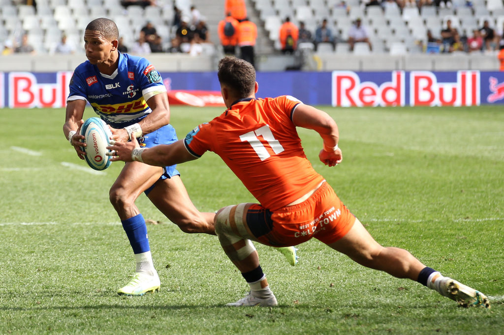 Manie Libbok of Stormers attempts to get past Damien Hoyland of Edinburgh during the United Rugby Championship 2022/23 match between Stormers and Edinburgh held at Cape Town Stadium in Cape Town, South Africa on 1 October 2022