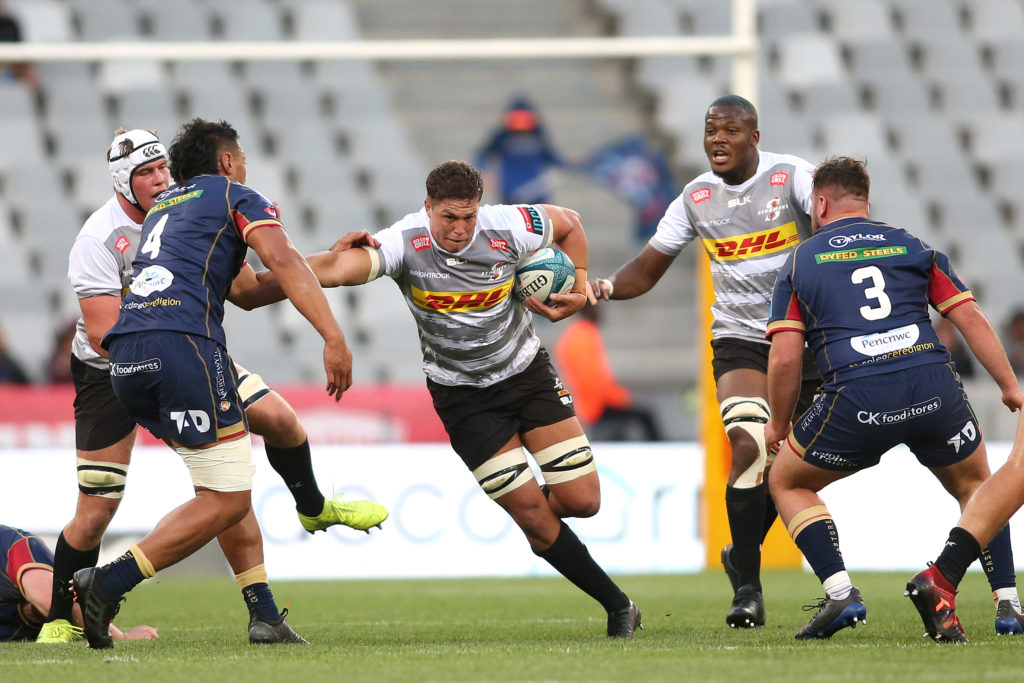 Gary Porter of Stormers attempts to hand off Sam Lousi of Llanelli Scarlets during the United Rugby Championship 2022/23 match between Stormers and Llanelli Scarlets held at Cape Town Stadium in Cape Town, South Africa on 25 November 2022