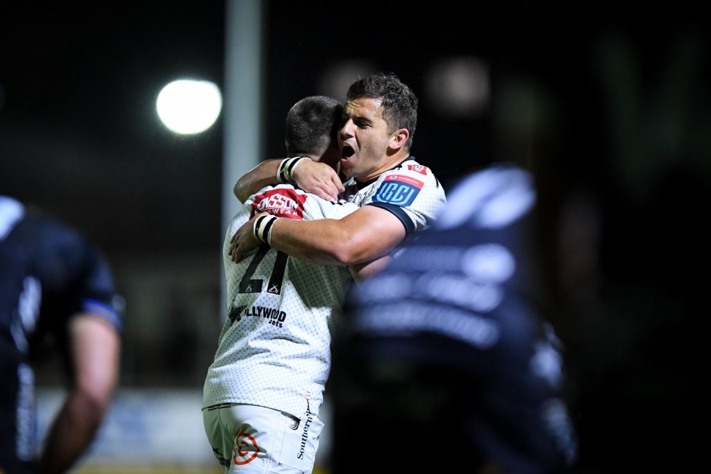 Dragons vs Cell C Sharks . Rohan Janse Van Rensburg of Cell C Sharks and Cameron Wright celebrate the win BKT United Rugby Championship, Rodney Parade, Newport, Wales - 01 Oct 2022
