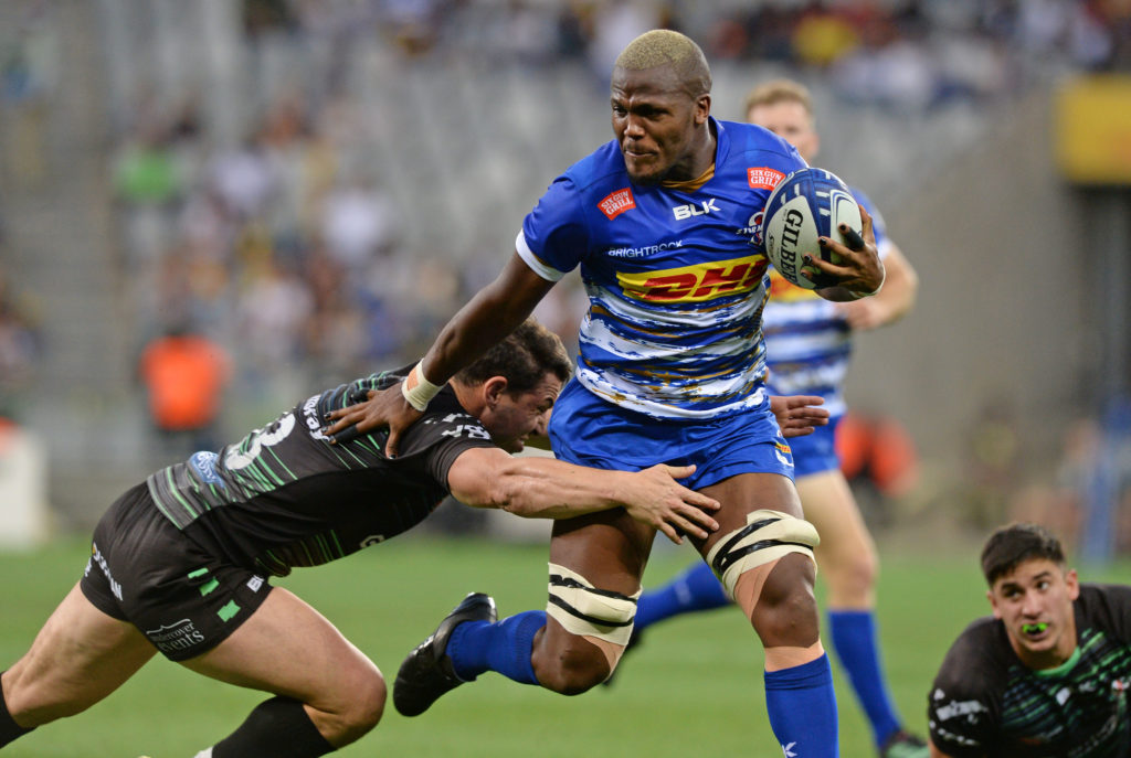 Hacjivah Dayimani of the Stormers is tackled by Luca Morisi of London Irish during the Heineken Champions Cup 2022/23 game between the Stormers and London Irish at Cape Town Stadium on 17 December 2022