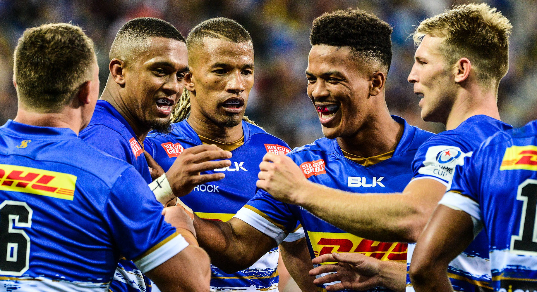 CAPE TOWN, SOUTH AFRICA - DECEMBER 17: Leolin Zas of DHL Stormers celebrates scoring a try with teammates during the Heineken Champions Cup match between DHL Stormers and London Irish at DHL Cape Town Stadium on December 17, 2022 in Cape Town, South Africa. (Photo by Grant Pitcher/Gallo Images).