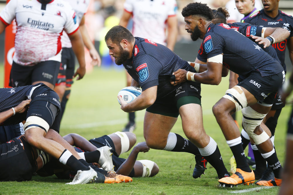 Sharks feast on fading Lions