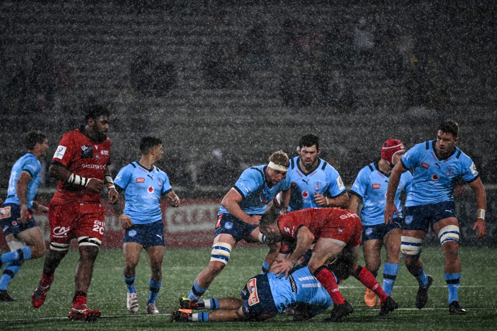 Players fight for the ball during the European Rugby Champions Cup pool A rugby union match between Lyon Olympique Universitaire (LOU) and the Bulls at the Gerland Stadium in Lyon on January 20, 2023. (Photo by OLIVIER CHASSIGNOLE / AFP)