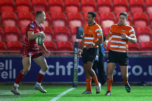 Johnny McNicoll of Scarlets reacts to scoring a try during round 3 (Pool B) of the 2022/2023 European Rugby Challenge Cup between Scarlets and Toyota Cheetahs at Parc y Scarlets on January 13, 2023 in Llanelli, Wales. (Photo by Michael Steele/Getty Images)