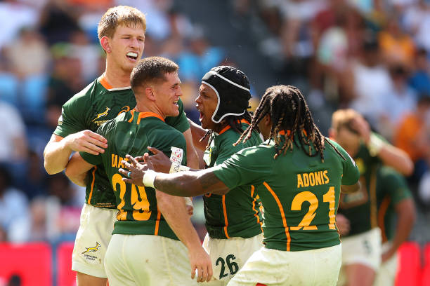 SYDNEY, AUSTRALIA - JANUARY 28: Ricardo Duarttee of South Africa celebrates victory with team mates during the 2023 Sydney Sevens match between New Zealand and South Africa at Allianz Stadium on January 28, 2023 in Sydney, Australia.