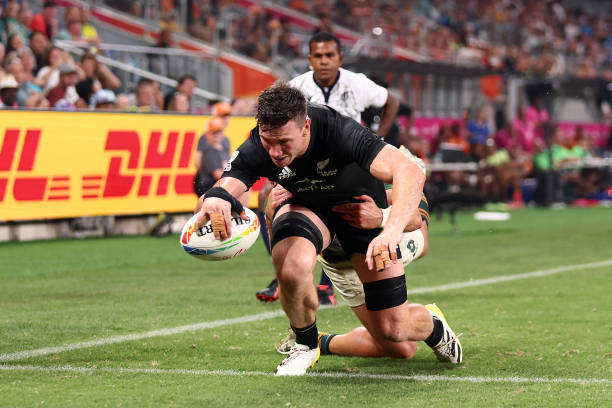 SYDNEY, AUSTRALIA - JANUARY 29: Sam Dickson of New Zealand scores a try during the 2023 Sydney Sevens match between New Zealand and South Africa at Allianz Stadium on January 29, 2023 in Sydney, Australia.
