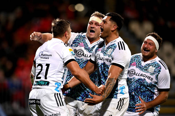 CHRISTCHURCH, NEW ZEALAND - FEBRUARY 24: Cortez Ratima of the Chiefs celebrates with his team after scoring a try during the round one Super Rugby Pacific match between Crusaders and Chiefs at Orangetheory Stadium, on February 24, 2023, in Christchurch, New Zealand.