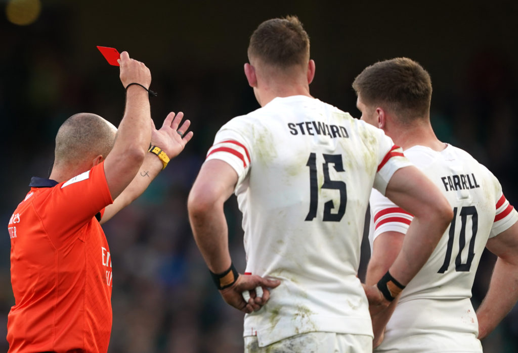 Referee Jaco Peyper sends off England's Freddie Steward during the Guinness Six Nations match at Aviva Stadium, Dublin. Picture date: Saturday March 18, 2023.