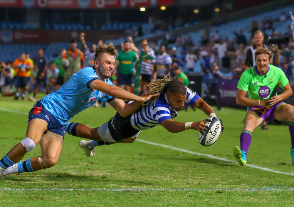 PRETORIA, SOUTH AFRICA - MARCH 17: David Kriel of the Vodacom Blue Bulls tries to tackle try scorer Clayton Blommetjies of the DHL Western Province during the Currie Cup, Premier Division match between Vodacom Bulls and DHL Western Province at Loftus Versfeld on March 17, 2023 in Pretoria, South Africa.