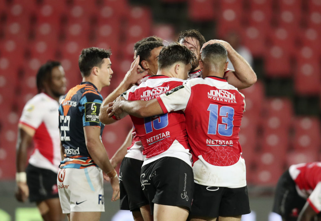 Gianni Lombard of the Lions celebrates with teammates after scoring a try during the European Rugby Challenge Cup 2022/23 match between Lions and Racing 92 at the Emirates Airline Park, Johannesburg on the 01 April 2023