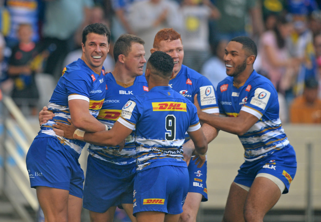 Stormers players celebrate a try scored by Deon Fourie of Stormers during the Heineken Champions Cup 2022/23 game between Stormers and Harlequins at Cape Town Stadium on 1 April 2023