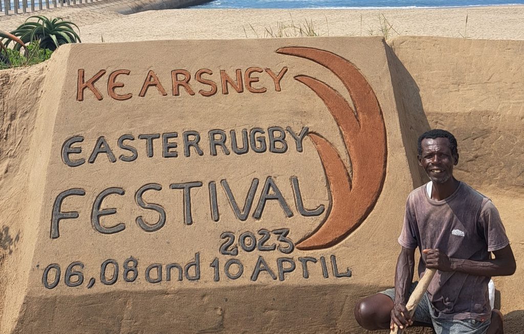 Sand artist Lucas Mahlangu spreads the Kearsney Easter Rugby Festival message.