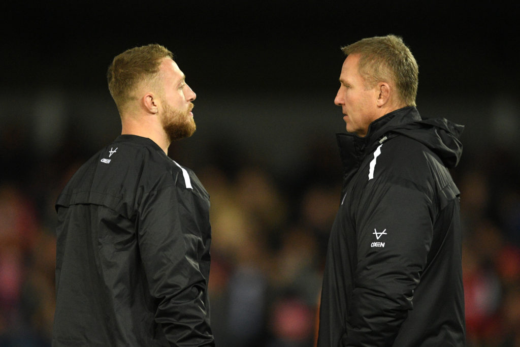 GLOUCESTER, ENGLAND - NOVEMBER 15: Ruan Ackermann of Gloucester Rugby(L) and Johan Ackermann, Head Coach of Gloucester Rugby speak prior to kick off during the Heineken Champions Cup Round 1 match between Gloucester Rugby and Toulouse at Kingsholm Stadium on November 15, 2019 in Gloucester, England.