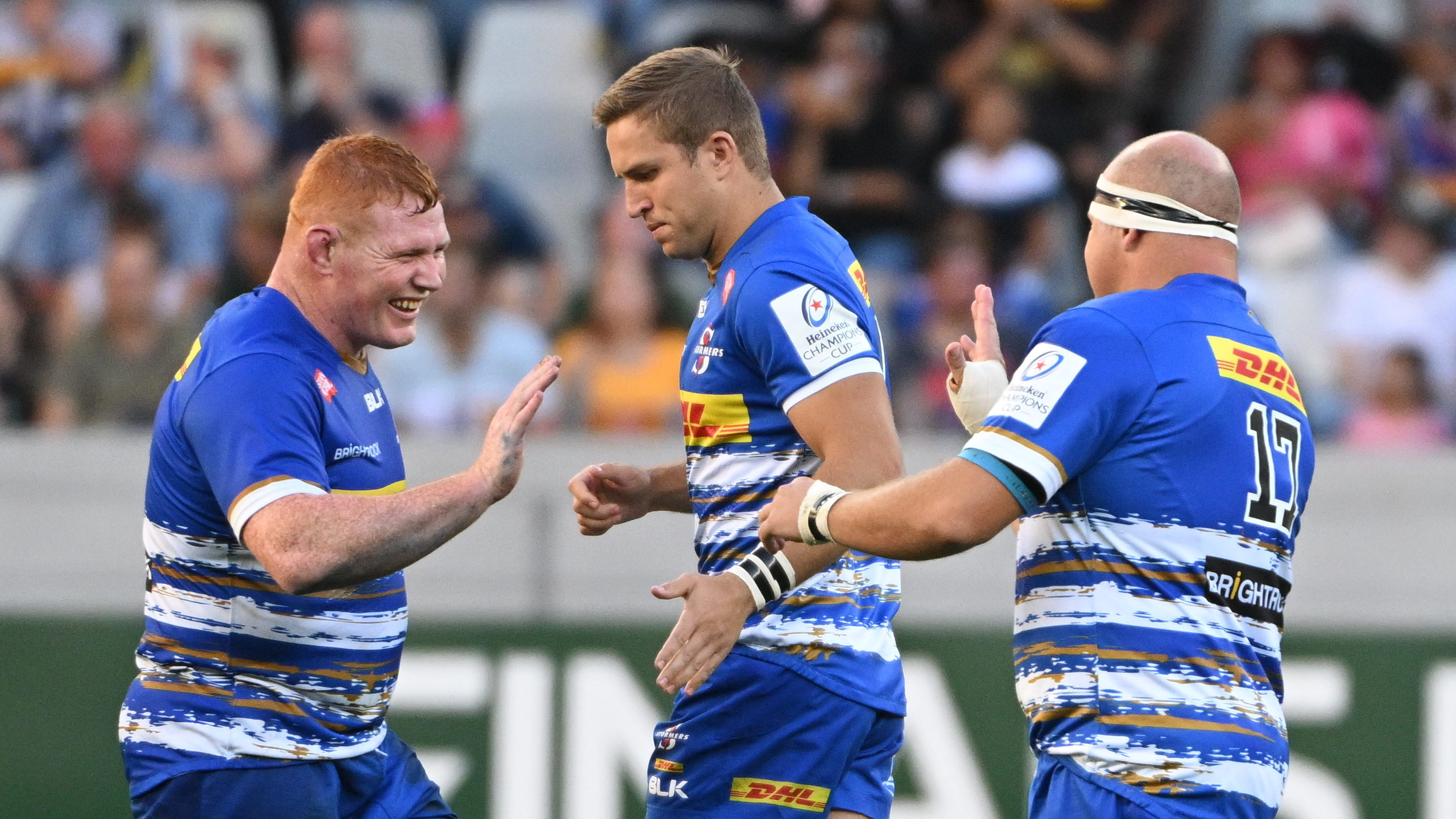 Heineken Champions Cup Round of 16, DHL Stadium, Cape Town, South Africa 1/4/2023 DHL Stormers vs Harlequins Steven Kitshoff (c) of the DHL Stormers welcomes Brok Harris of the DHL Stormers onto the field Mandatory Credit ©INPHO/Steve Haag Sports/Thinus Maritz