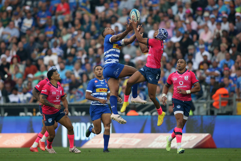 Damian Willemse of Stormers and Kurt-Lee Arendse of the Bulls challenge for the high ball during the United Rugby Championship 2022/23 match between Stormers and Bulls held at Cape Town Stadium in Cape Town, South Africa on 23 December 2022