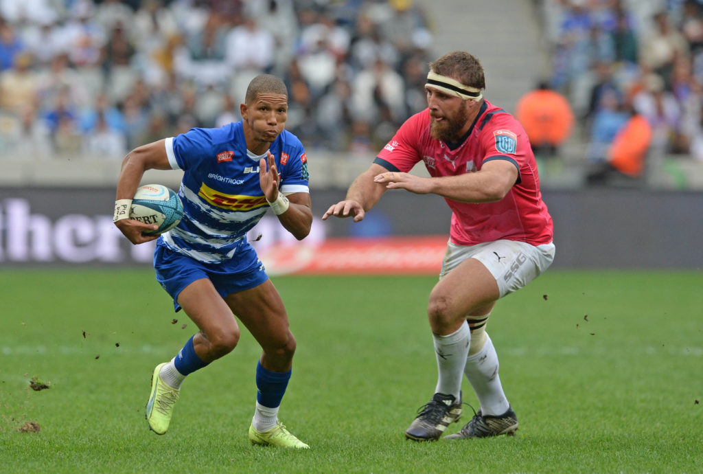 Manie Libbok of Stormers goes past Gerhard Steenekamp of Bulls to create a try scoring opportunity during the United Rugby Championship 2022/23 quarterfinal between the Stormers and Bulls at Cape Town Stadium on 6 May 2023