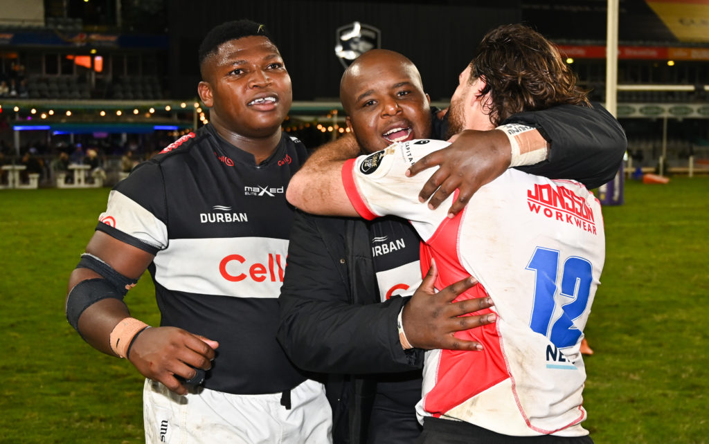 Ntuthuko Mchunu of the Cell C Sharks (left) and Khutha Mchunu of the Cell C Sharks are happy to see Marius Louw, Captain of the Fidelity ADT Lions during the 2023 Currie Cup match between Sharks and Lions held at Kings Park in Durban on 03 June 2023 ©Gerhard Duraan/BackpagePix