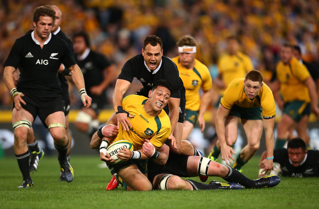 SYDNEY, AUSTRALIA - AUGUST 17: Israel Dagg of the All Blacks tackles Christian Leali'ifano of the Wallabies during The Rugby Championship Bledisloe Cup match between the Australian Wallabies and the New Zealand All Blacks at ANZ Stadium on August 17, 2013 in Sydney, Australia.