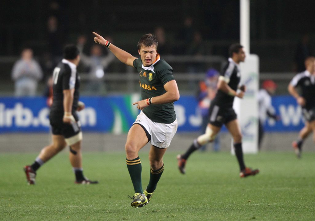 CAPE TOWN, SOUTH AFRICA - JUNE 22, Handre Pollard from South Africa celebrates a drop goal during the IRB Junior World Championships final match between South Africa and New Zealand at DHL Newlands on June 22, 2012 in Cape Town, South Africa