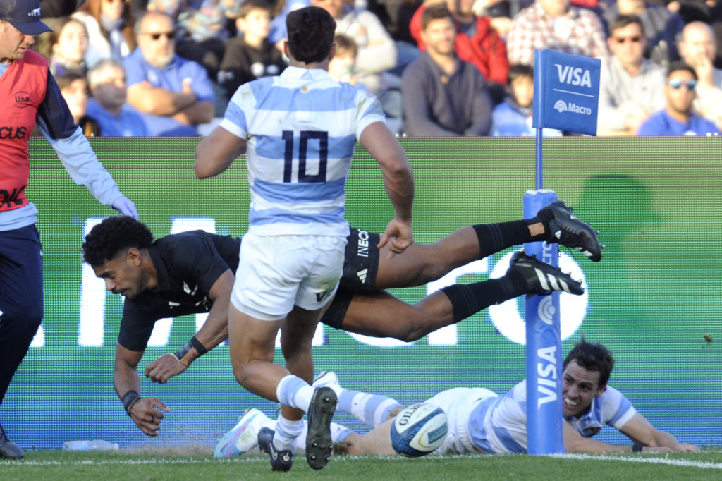 New Zealand's Emoni Narawa scores a try during the Rugby Championship 2023 first round match between Argentina's Los Pumas and New Zealand's All Blacks at the Malvinas Argentinas stadium in Mendoza, Argentina, on July 8, 2023.