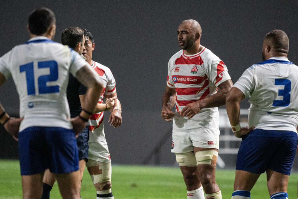 Japan's Michael Leitch (2R) looks at the umpire for showing a red card during the rugby union match between Japan and Samoa in the Lipovitan D Challenge Cup 2023 at the Sapporo Dome in Sapporo on July 22, 2023.