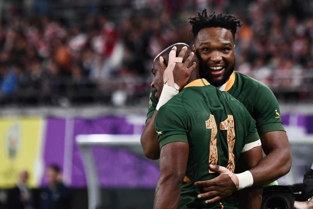 Makazole Mapimpi celebrates with Lukhanyo Am in the 2019 World Cup final
