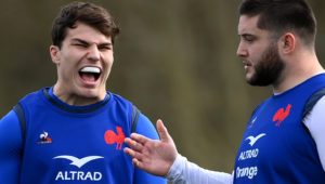 France's scrum half Antoine Dupont (L) grimaces next to France's loosehead prop Cyril Baille during a training session in Marcoussis, south of Paris, on March 15, 2023, as part of the preparation for the Six Nations Rugby Union tournament match between France and Wales scheduled for March 18 in Paris.