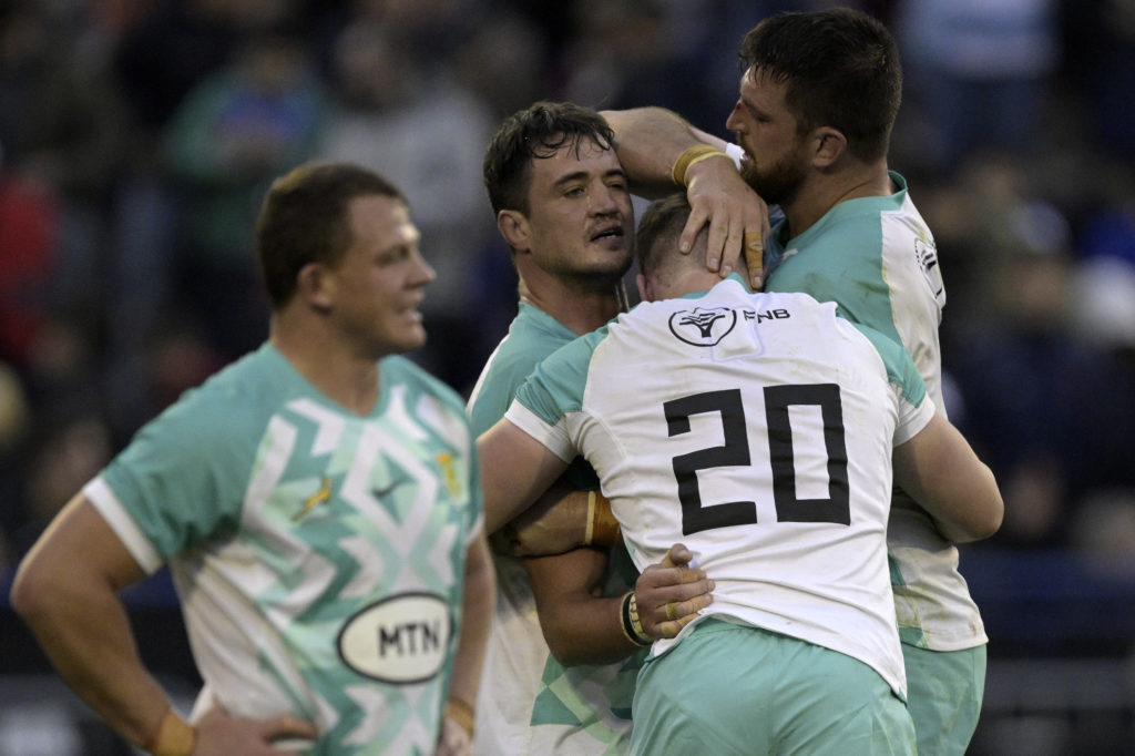 South Africa's Springboks flanker Franco Mostert (2-L) celebrates with teammates flanker Evan Roos (#20) and lock Jean Kleyn after defeating Argentina's Los Pumas during their Rugby Union test match at Jose Amalfitani stadium in Buenos Aires, on August 5, 2023 in preparation for the upcoming 2023 Rugby World Cup in France.