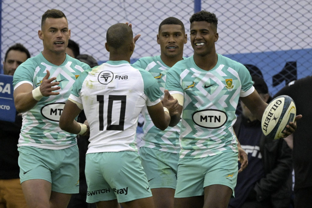 South Africa's Springboks wing Canan Moodie (R) celebrates with teammates after scoring a try against Argentina's Los Pumas during the Rugby Union test match at Jose Amalfitani stadium in Buenos Aires, on August 5, 2023 in preparation for the upcoming 2023 Rugby World Cup in France.