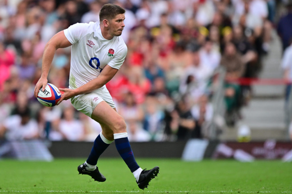 England's fly-half Owen Farrell passes the ball during the Summer Series international rugby union match between England and Wales at Twickenham Stadium, south-west London, on August 12, 2023.