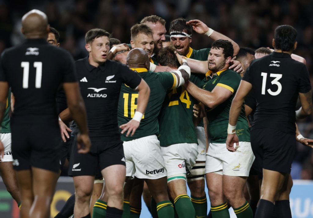 South Africa's flanker Kwagga Smith (C) celebrates scoring a try during the pre-World Cup Rugby Union match between New Zealand and South Africa at Twickenham Stadium in west London, on August 25, 2023.