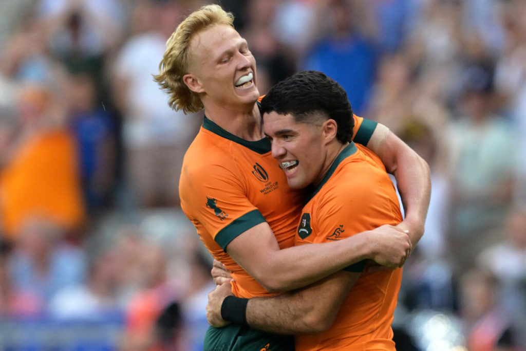 Australia's full-back Ben Donaldson (R) celebrates with Australia's fly-half Carter Gordon after scoring a try during the France 2023 Rugby World Cup Pool C match between Australia and Georgia at Stade de France in Saint-Denis, on the outskirts of Paris, on September 9, 2023.