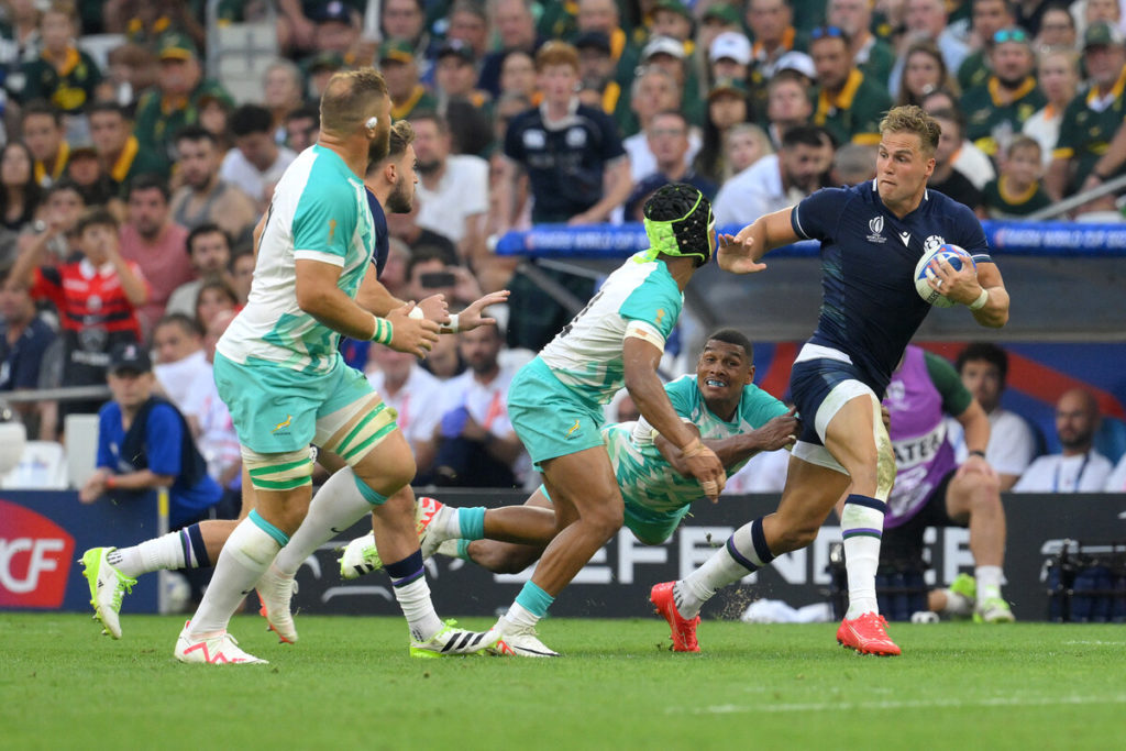 South Africa's full back Damian Willemse (C) attempts to tackle Scotland's wing Duhan Van Der Merwe (R) during the France 2023 Rugby World Cup Pool B match between South Africa and Scotland at Stade de Marseille in Marseille, southern France on September 10, 2023.