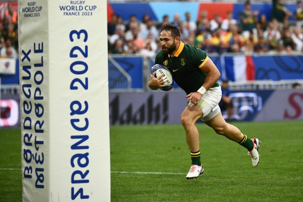 South Africa's scrum-half Cobus Reinach runs to score the team's third try during the France 2023 Rugby World Cup Pool B match between South Africa and Romania at Stade de Bordeaux in Bordeaux, south-western France on September 17, 2023.