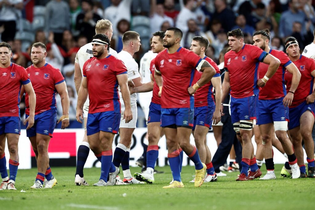 Chile's and England's players shake hands after the France 2023 Rugby World Cup Pool D match between England and Chile at Stade Pierre-Mauroy in Lille, northern France on September 23, 2023.