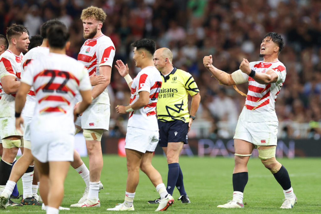 Japan's number eight and captain Kazuki Himeno (R) screams in celebration at Japan's victory at the end of the France 2023 Rugby World Cup Pool D match between Japan and Samoa at the Stadium de Toulouse in Toulouse, southwestern France on September 28, 2023.