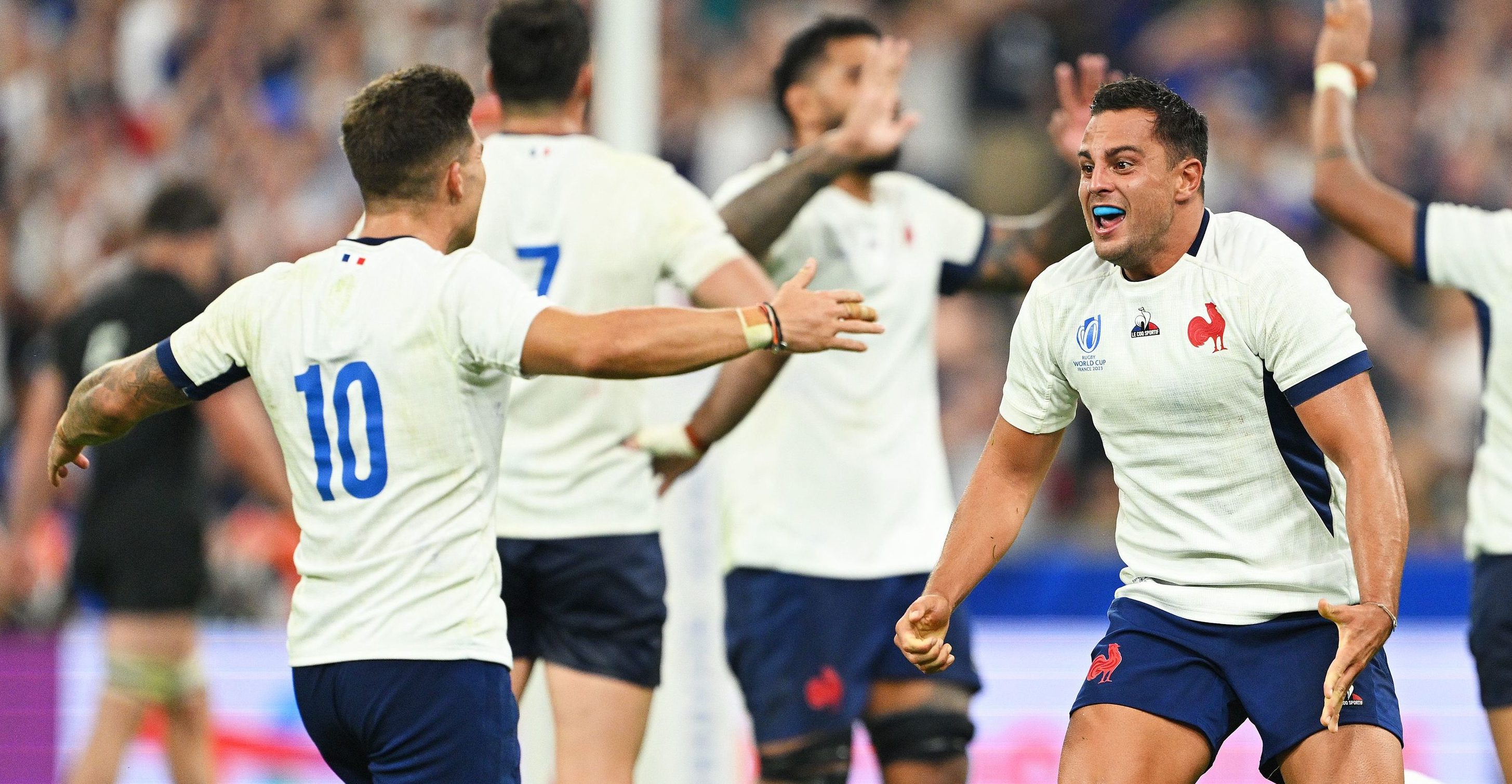 PARIS, FRANCE - SEPTEMBER 08: Matthieu Jalibert and Arthur Vincent of France celebrate victory at full-time following the Rugby World Cup France 2023 Pool A match between France and New Zealand at Stade de France on September 08, 2023 in Paris, France. (Photo by David Ramos - World Rugby/World Rugby via Getty Images)