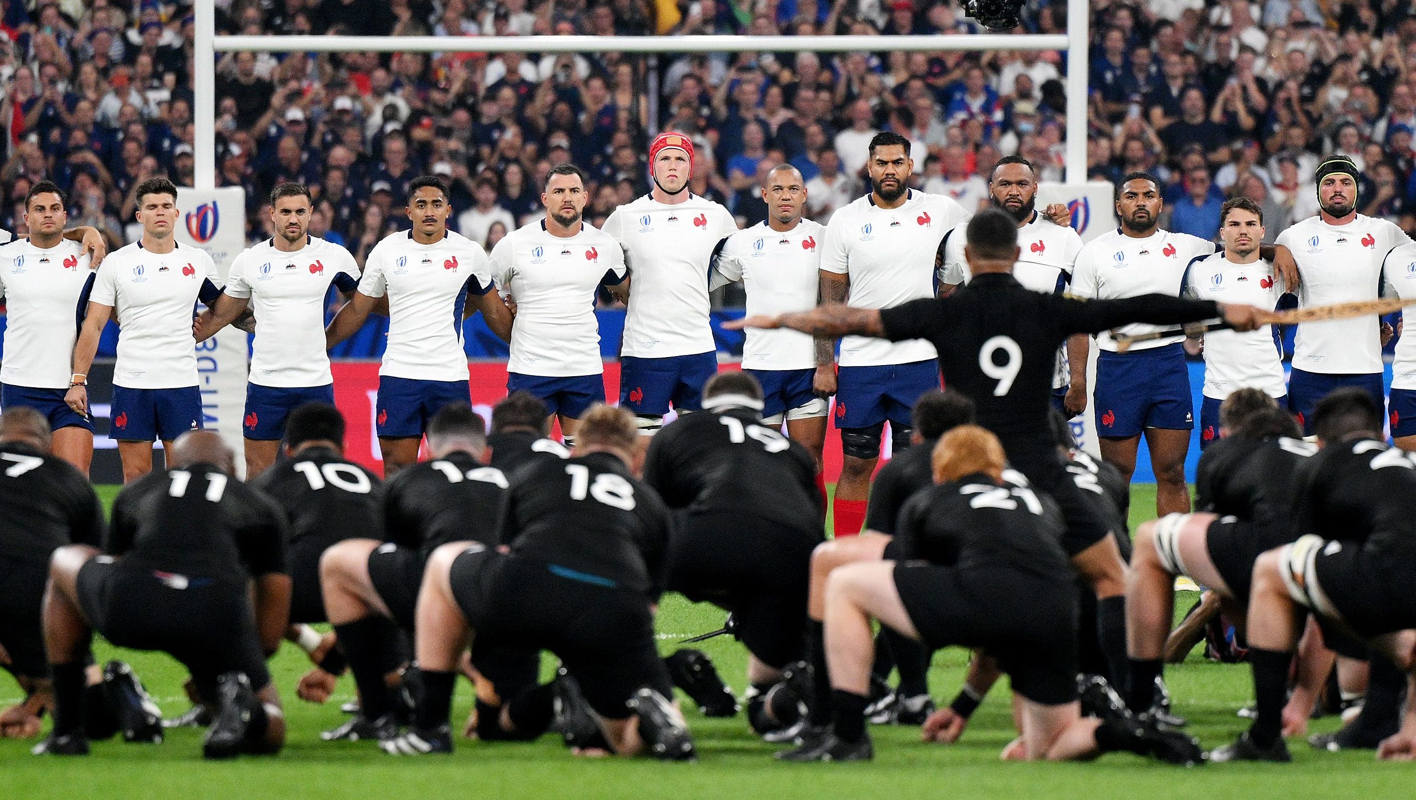 PARIS, FRANCE - SEPTEMBER 08: The players of France watch on as the players of New Zealand perform the Haka prior to the Rugby World Cup France 2023 Pool A match between France and New Zealand at Stade de France on September 08, 2023 in Paris, France. (Photo by David Ramos - World Rugby/World Rugby via Getty Images)