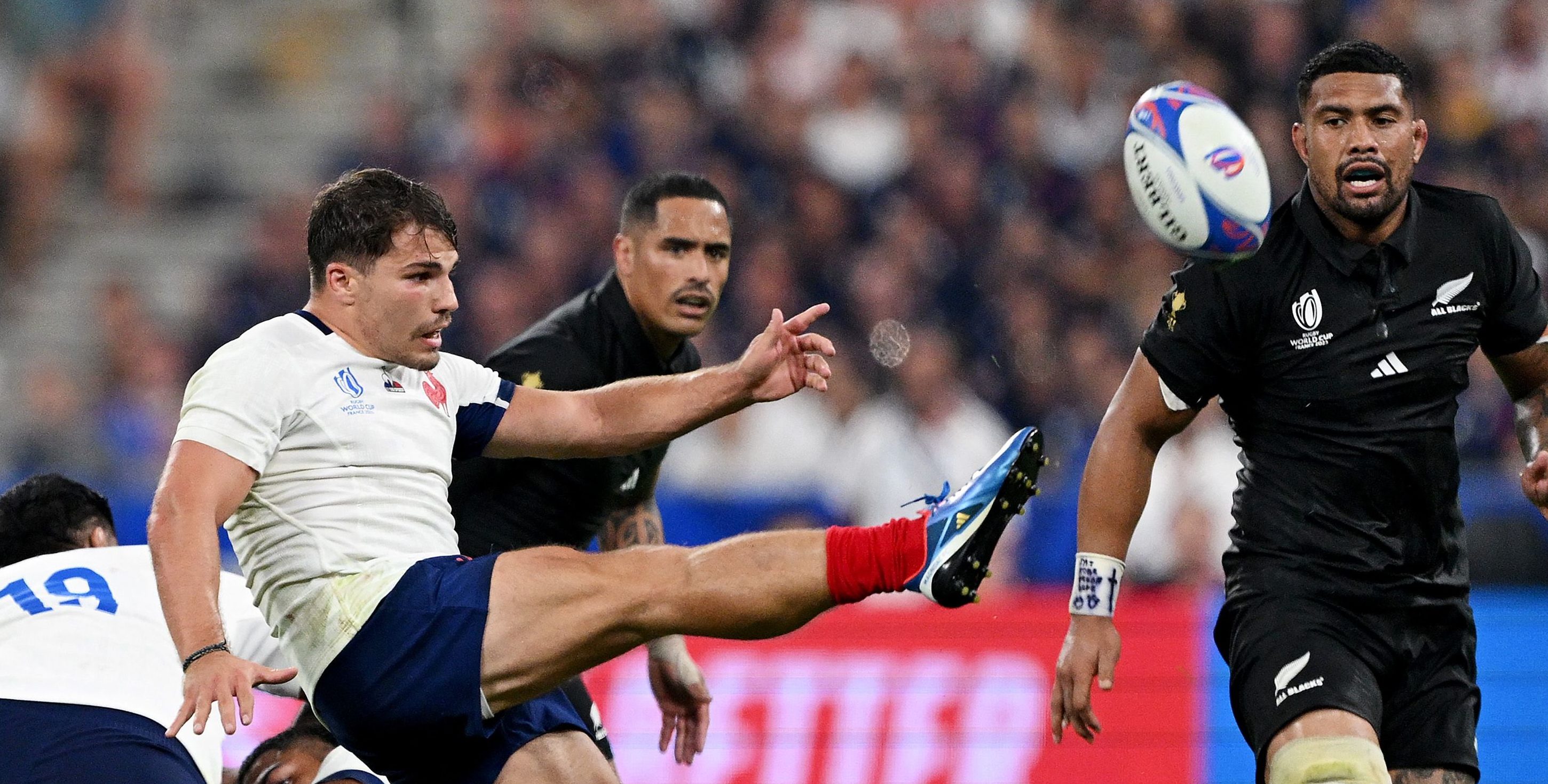 PARIS, FRANCE - SEPTEMBER 08: Antoine Dupont of France plays a kick from the ruck during the Rugby World Cup France 2023 Pool A match between France and New Zealand at Stade de France on September 08, 2023 in Paris, France. (Photo by David Ramos - World Rugby/World Rugby via Getty Images)