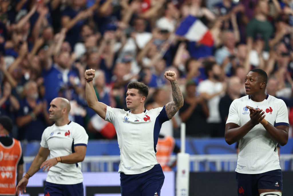 (From L to R) France's scrum-half Maxime Lucu, France's fly-half Matthieu Jalibert and France's lock Cameron Woki celebrate the victory during the France 2023 Rugby World Cup Pool A match between France and New Zealand at Stade de France in Saint-Denis, on the outskirts of Paris on September 8, 2023. (