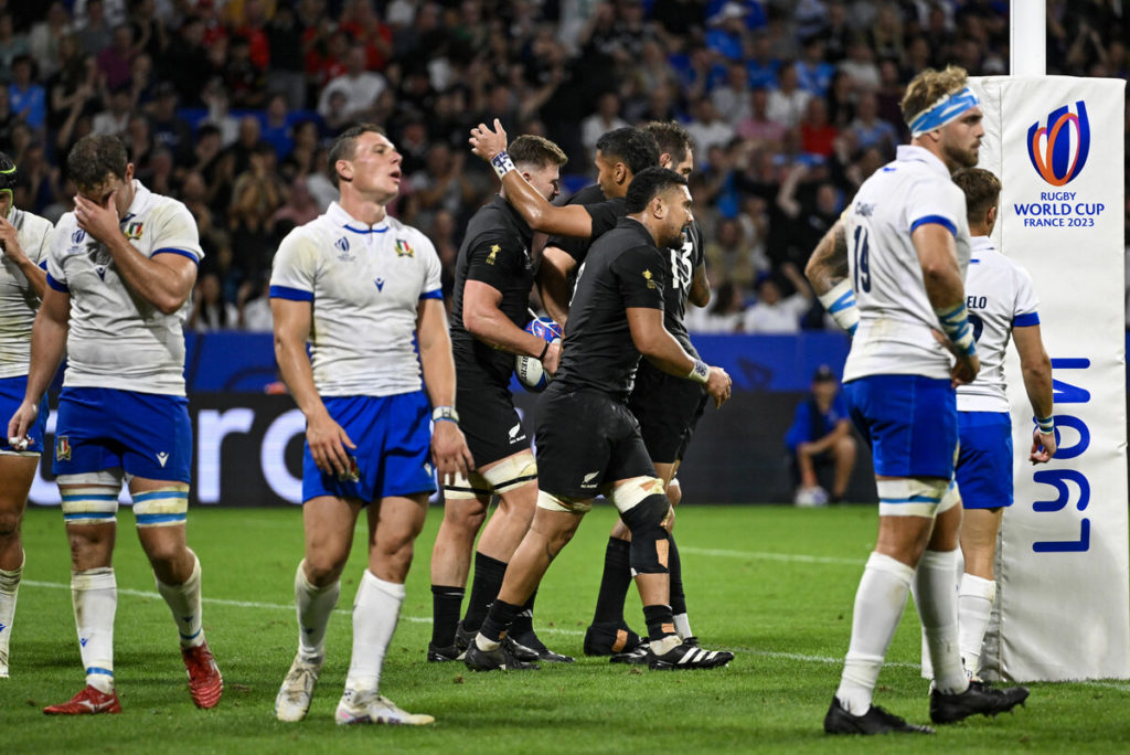 New Zealand's openside flanker Dalton Papali'i (C) celebrates with teammates after scoring a try during the France 2023 Rugby World Cup Pool A match between New Zealand and Italy at the OL Stadium in Decines-Charpieu, near Lyon, south-eastern France, on September 29, 2023.