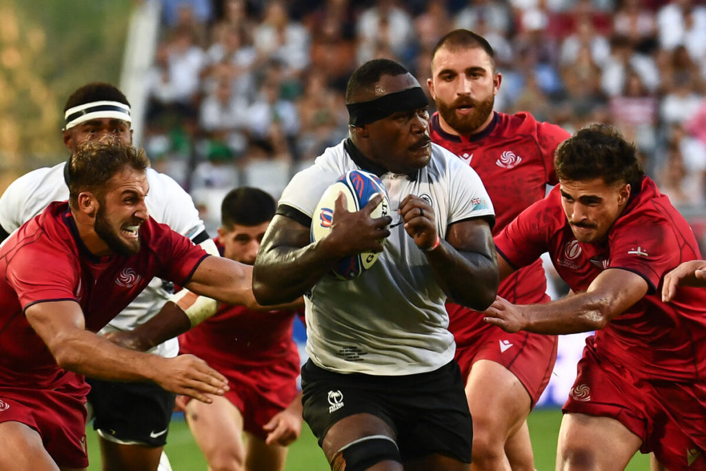 Fiji's flanker Levani Botia (C) runs with the ball during the France 2023 Rugby World Cup Pool C match between Fiji and Georgia at the stade de Bordeaux in Bordeaux, southwestern France, on September 30, 2023.
